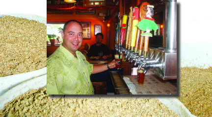 Kona Brewing Company CEO and President Mattson Davis draws a draft from the lineup of barrel-aged specialty beers that are served exclusively at Kona Brewpub.