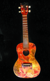 A one-of-a-kind hand-painted ukulele, created for a recent fundraiser at Tiffany’s.