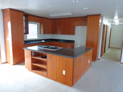 The Model Home Project engages students in all aspects of building a home, including installing cabinetry and fixtures. photo courtesy Hawai‘i Community College