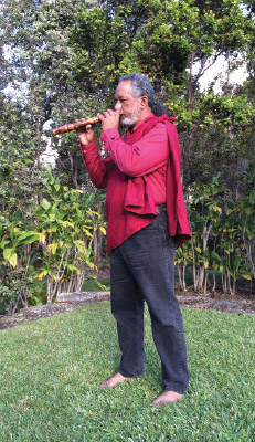 Manu recalls the sounds of the native Hawaiian forest with the music of his flute.