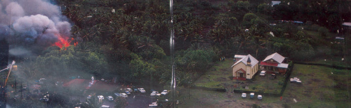 Lava flowing towards the Kalapana Maunakea Church in 1990.