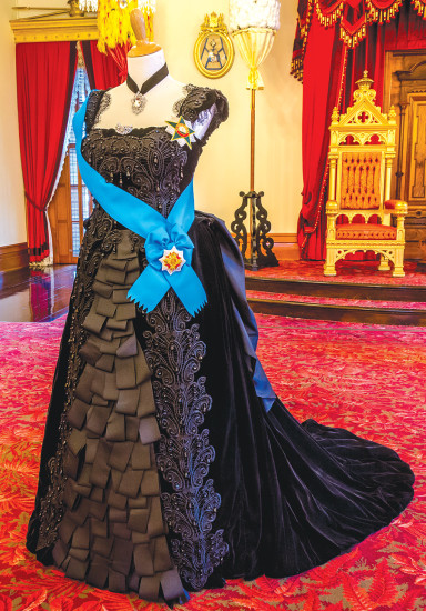 Reproduction of black ribbon gown worn by Queen Lili‘uokalani, on display at ‘Iolani Palace. photo courtesy of Bonnie Nims