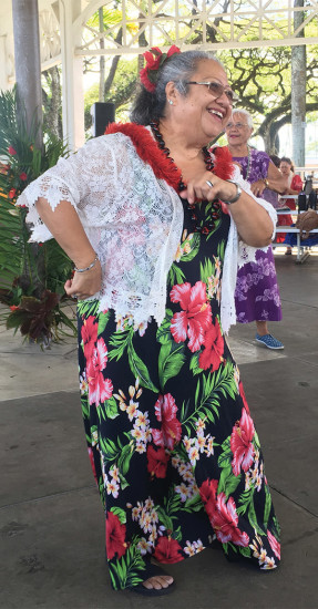 Dancer Rose Manuia-Kuamo‘o charms the crowd with her hula interpretations. photo by Karen Valentine