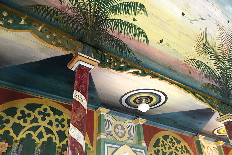 The murals on the walls and ceilings flow together seamlessly.