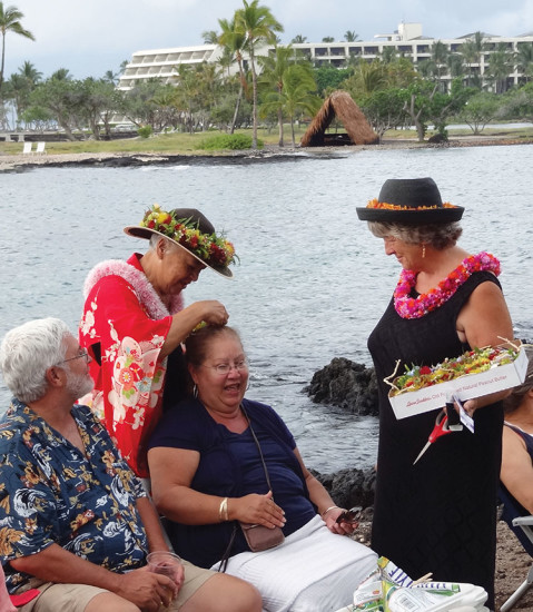 Aunty Maile and Anne Dressel handing out lei at Twilight at Kalahuipua‘a.