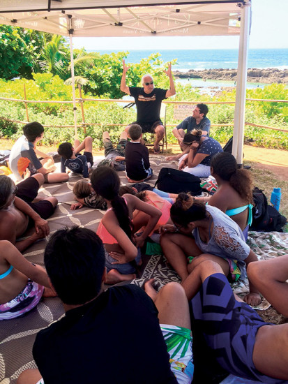 Brother Noland speaking with keiki and adults about the ocean. photo courtesy of Brother Noland