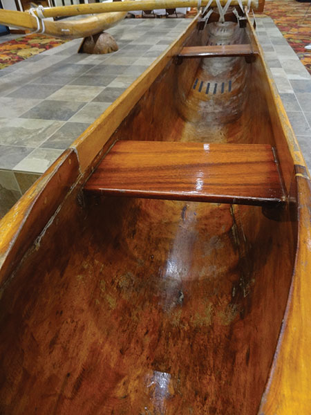 Hand-smoothed, dugout hull of the koa Mahoe canoe 