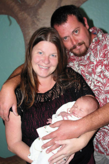Owner Melissa Fletcher and her husband, Jupiter Crosson, with baby Zetta