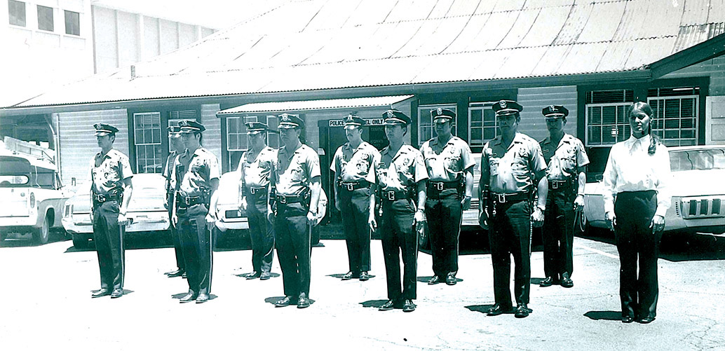 Hilo police officers in formation, behind the courthouse/police station building and in front of the annex, circa 1970. photo courtesy of Hilo Police Department, County of Hawai‘i