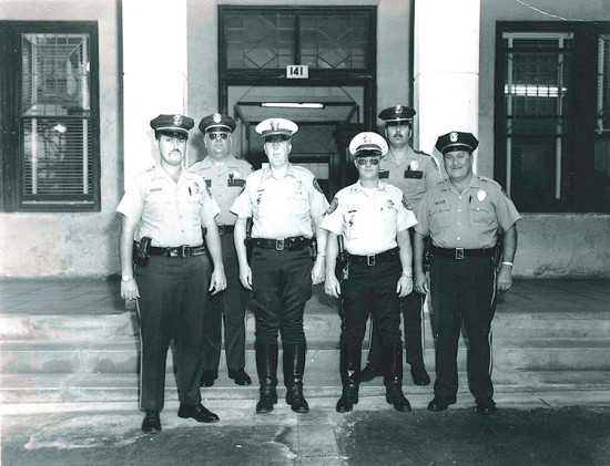 Hilo police officers on front lānai of building, circa 1970. photo courtesy of Hilo Police Department, County of Hawai‘i