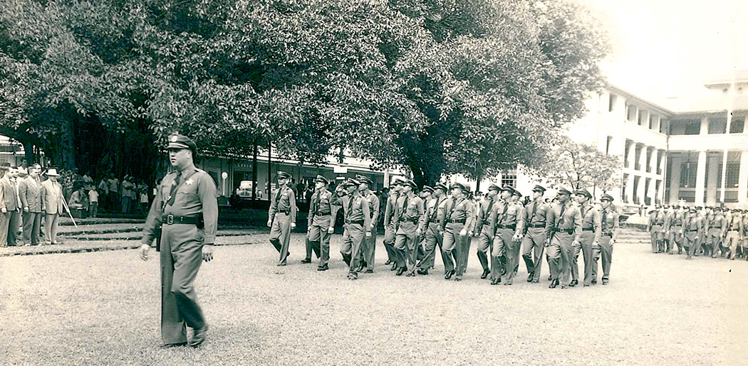 Hilo police force in Kalākaua Park, across from the Hilo Police Station, circa 1940. photo courtesy of Hilo Police Department, County of Hawai‘i