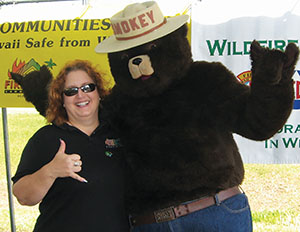 Denise Laitinen and Smokey Bear at 2013 Fire Prevention Week event in Hilo.