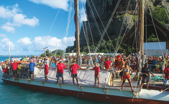 Maupiti, French Polynesia arrival. Hōkūle‘a Image ® Polynesian Voyaging Society; Photo © ‘Ōiwi TV. Photographer: Scott Kanda