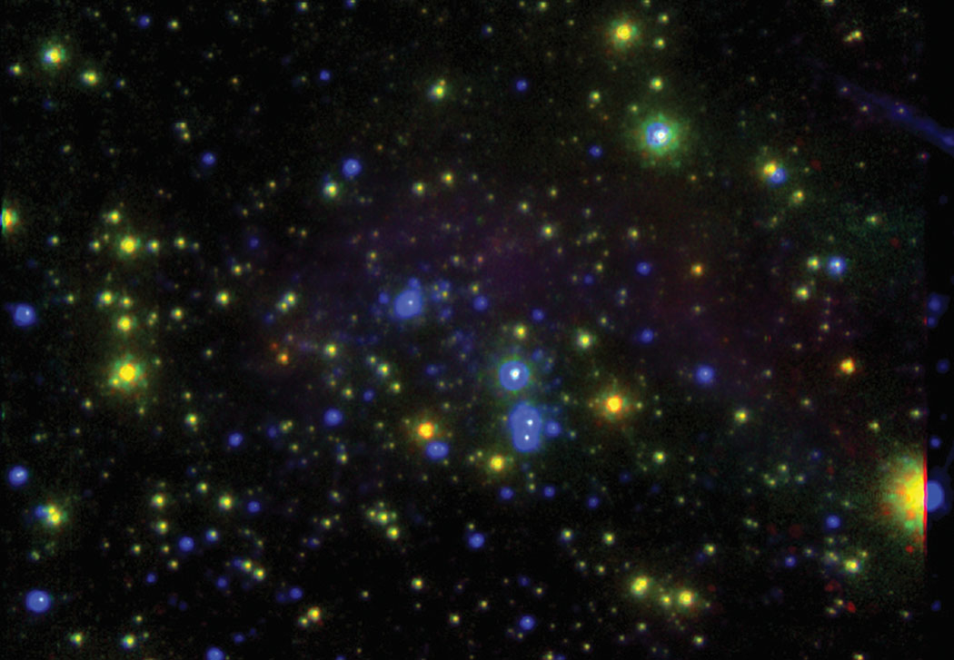keck-The central starburst region of the dwarf galaxy IC 10. In this composite color image, near infrared images obtained with the Keck II telescope have been combined with visible-light images taken with NASA’s Hubble Space Telescope to reveal distinct populations of red and blue stars. photo credit: UC Berkeley/NASA/W. M. Keck Observatory