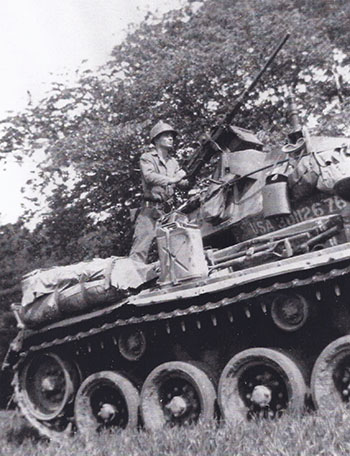 Platoon Leader Paris on an M24 tank in Pilsen, Czechoslovakia, WWII.