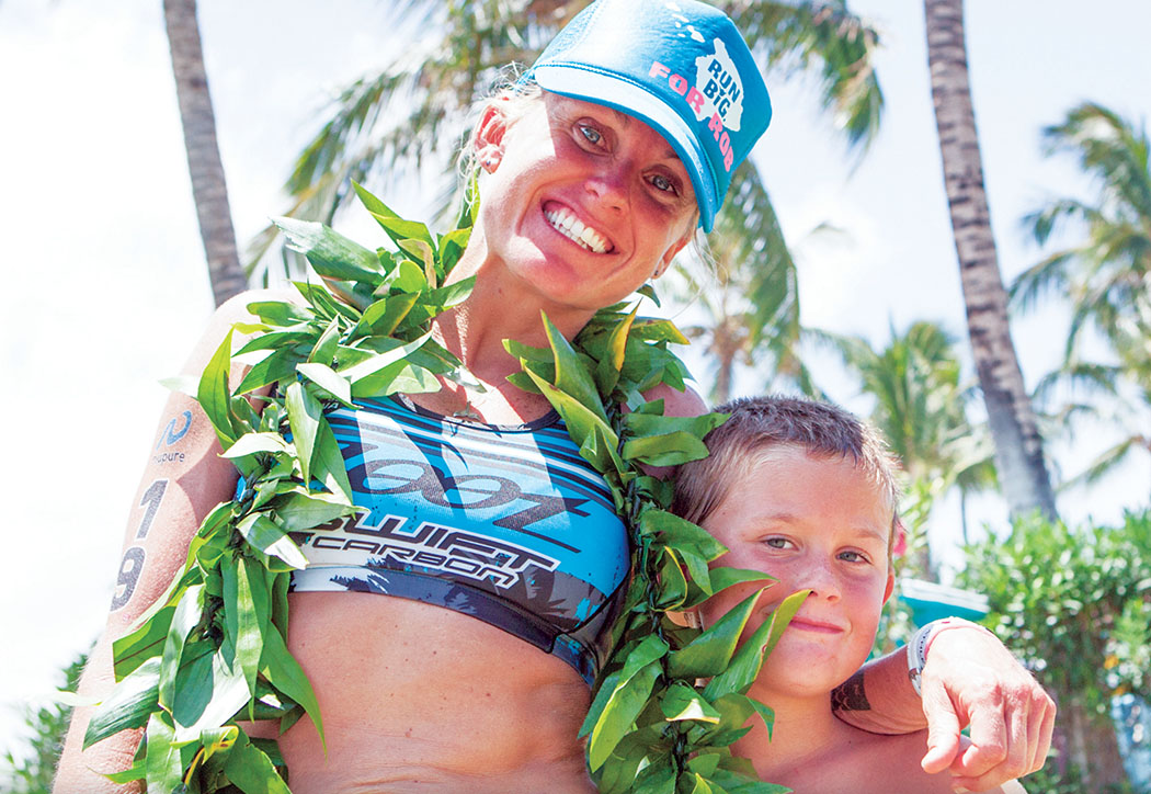 Bree Wee with son Kainoa after the 2012 Ironman World Championship in Kailua-Kona.