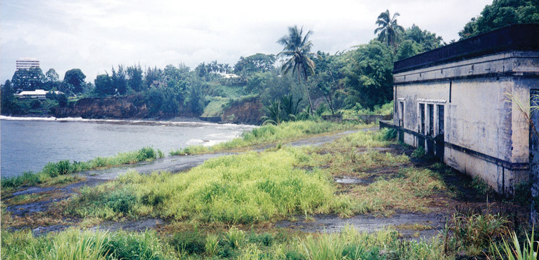 Hilo Bayshore Tower on the far left, warehouse on right.