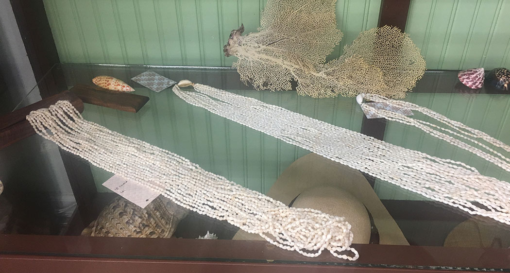 Shell lei by Kumu Kele at Hana Hou in downtown Hilo. These lei may be worn by both the bride and groom at weddings. photo by Paula Thomas