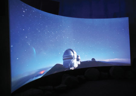 Inside ‘Imiloa’s Piko‘i Theater, spectators can watch a real time-lapse video of the night sky as it appears from Maunakea’s summit. photo by Stefan Verbano