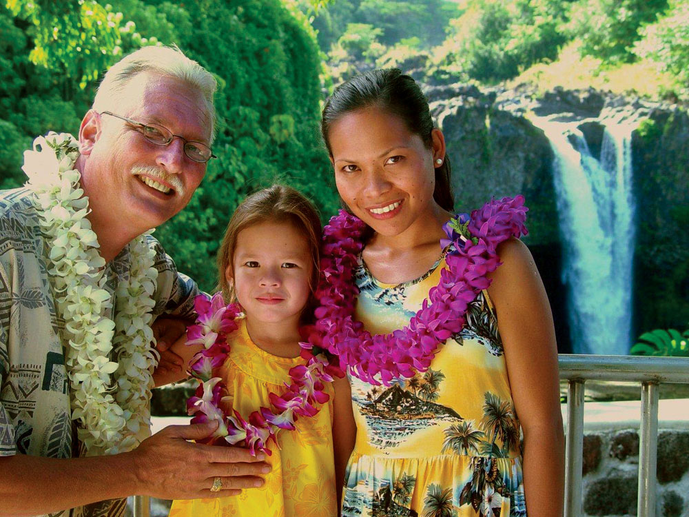 Mark (50) and Jonaliza Allen (36) make it a priority to take time off from their business to spend it with their daughter Rosalyn (10) and enjoy the local, natural wonders such as Rainbow Falls, near their home.