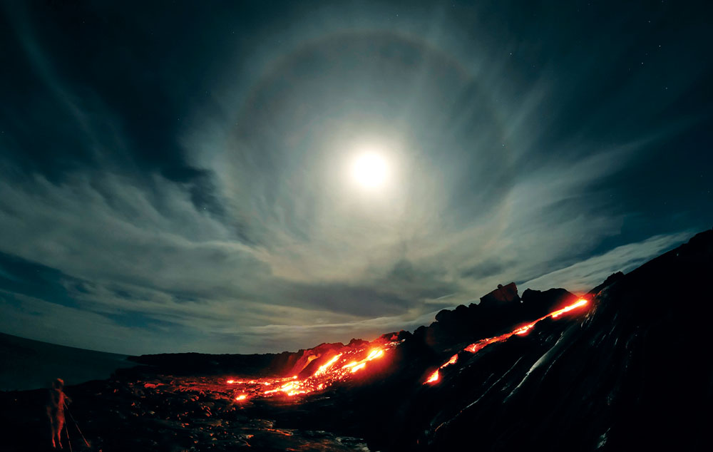 “Lunar Halo”—Nature’s night sky produces some spectacular effects, such as this lunar halo, to complement the glowing lava.