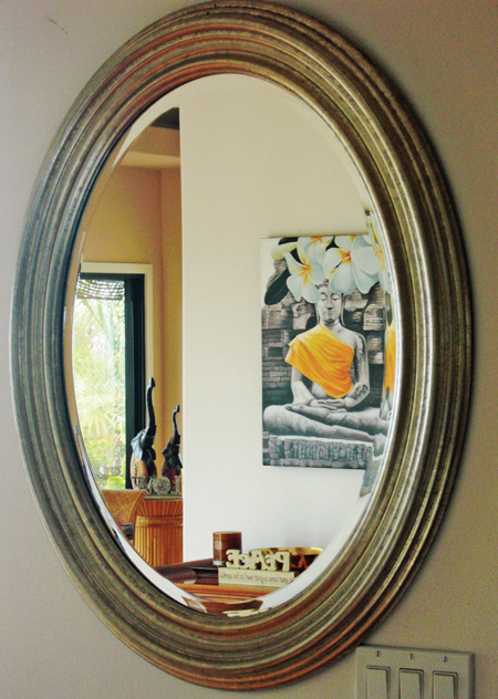 Increase focus and invite creative opportunity with an oval or circular mirror near the entrance.
