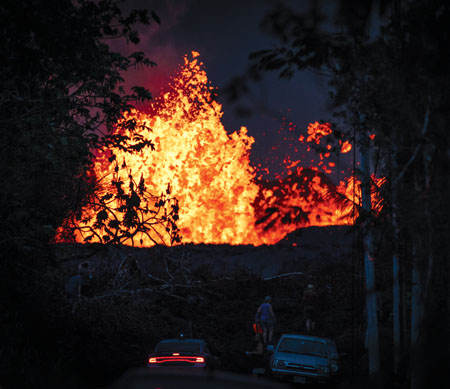 Lava erupting in Leilani Estates on Makamae St. photo courtesy of Ken Boyer