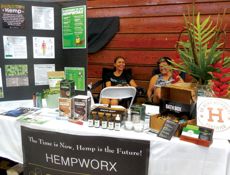 Vendors at the Hawai‘i Cannabis Awareness Conference, held inside Hilo’s Afook-Chinen Civic Auditorium in mid-June, offer everything from CBD cookies and snacks to cosmetics, chocolates, and oils–even dog treats! photo by Stefan Verbano