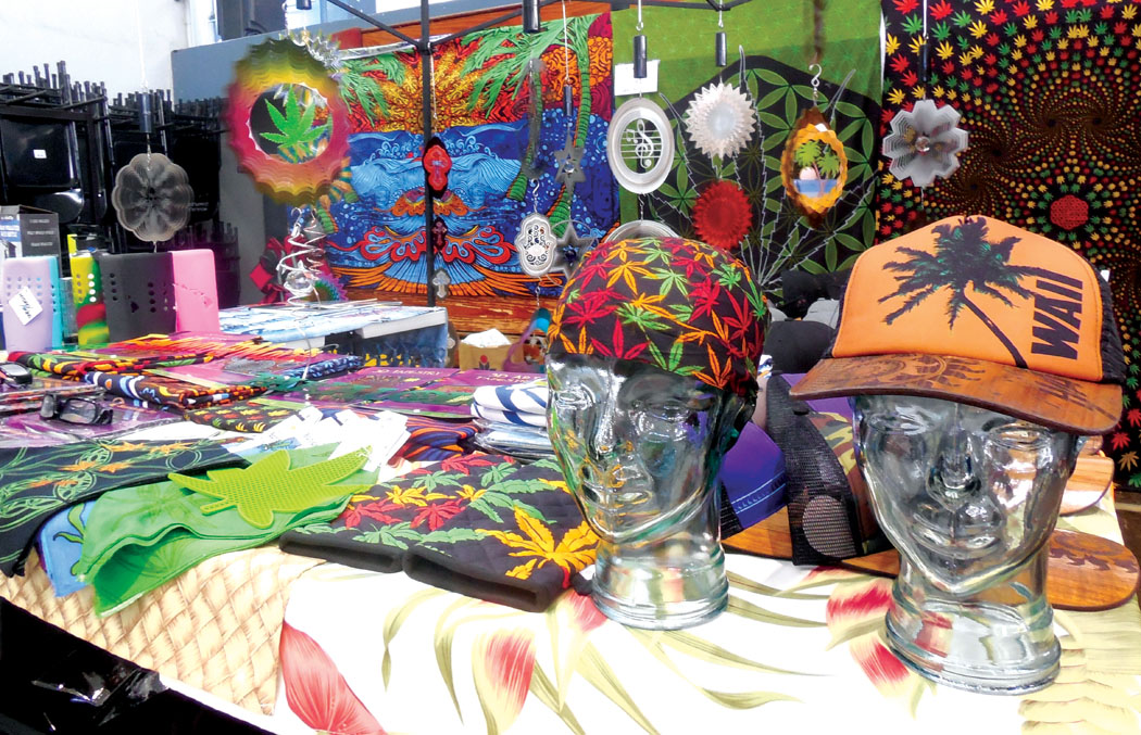 In addition to edibles, Cannabis Conference vendors sold ganja gear, too. Clothes, hats, tapestries, sun catchers, and other accessories, adorned with tie-dye, Rasta colors, and weed-leaf patterns, were all on display. photo by Stefan Verbano