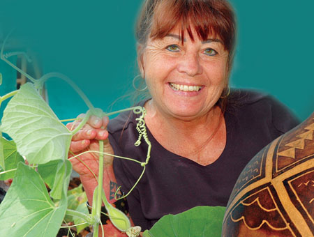 Momi Greene of Kona is dedicated to practicing the traditional ways of preparing and decorating gourds.