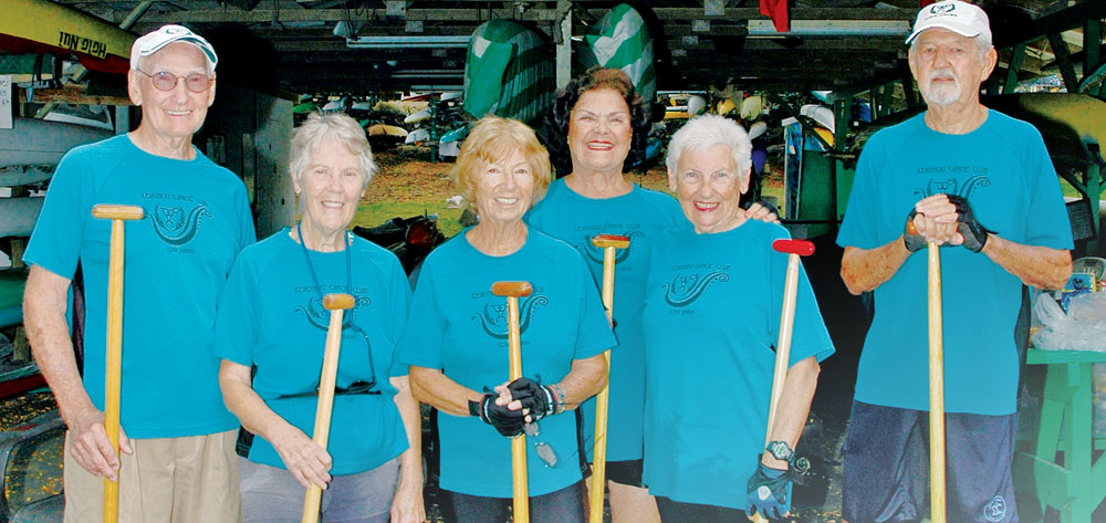 Octogenarian paddlers who practice three times a week as members of Keauhou Canoe Club’s recreational program include from left: Paul O’Brien, Joanie Clark, Cari Mathyssens, Joan Lawhead, Virginia Isbell (who’s the youngster at 78 and sometimes helps as steersman) and Elton Moller. photo by Fern Gavelek