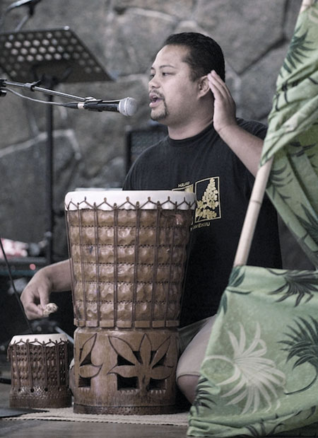 Kumu Hula Aloha Victor of Halau Kala‘akeakauikawekiu with his large pahu, named “Naupaka.” The smaller drum, was also made by Uncle Kala. photo courtesy of Halau Kala‘akeakauikawekiu