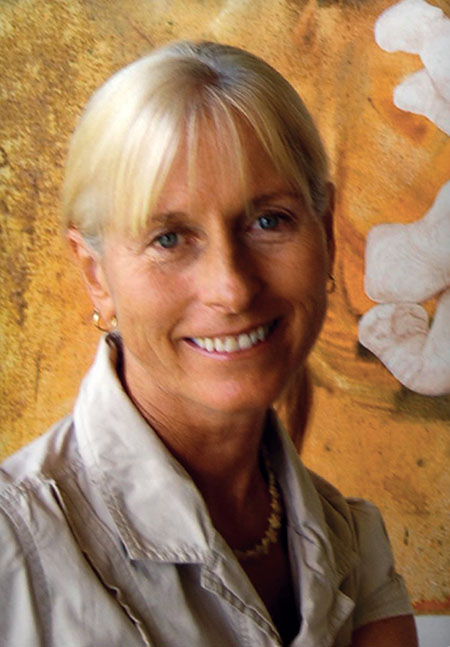 Artist, muralist, environmentalist, yoga teacher, and stained glass designer Calley O’Neill.