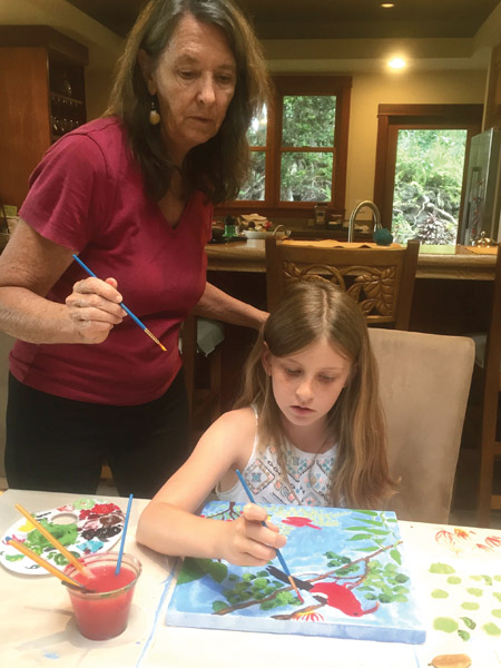 Maya and Ella painting together. photo courtesy of Heather Mettler