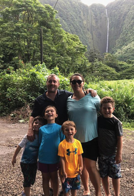 Maka poses for a photo with her husband and four children during an adventure to Waipi‘o Valley.