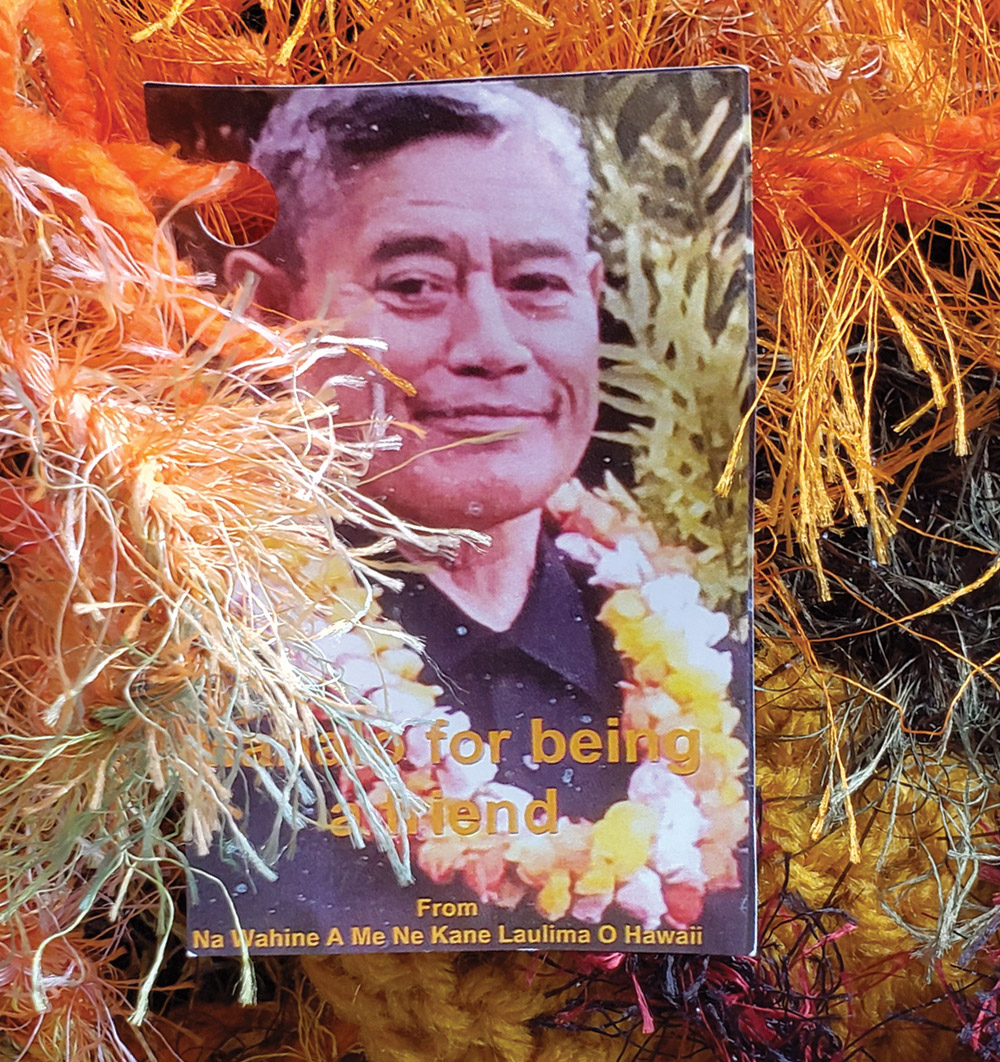 Stan would often help with lei-making at Hula Tuesdays. Lei were given out at Stan’s Celebration of Life. photo by Sara Stover