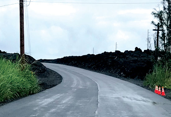 A bend in the road along the new upper section of Highway 132 with paving complete, September 2019. photo courtesy of Hawai‘i County Department of Public Works