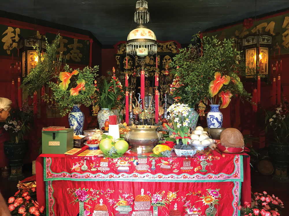 Altar colorfully decorated for 2019 Lunar New Year. photo by Barbara Garcia