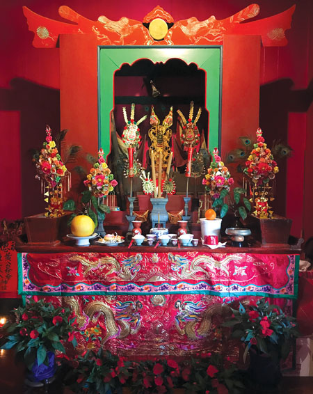 Central altar dedicated to Patron Diety Kwan Kung, patron saint of the Tong Wo Society. photo by Barbara Garcia