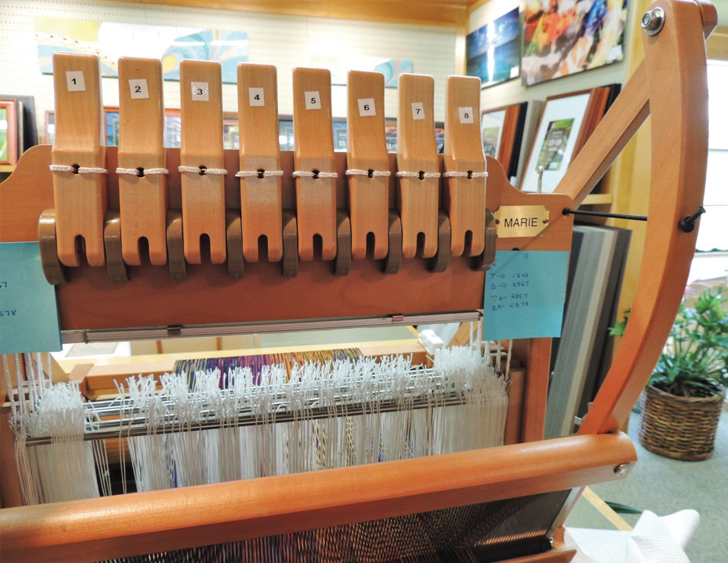 Traditionally, every weaver’s loom has its own name. This one is “Marie.” photo by CTarleton
