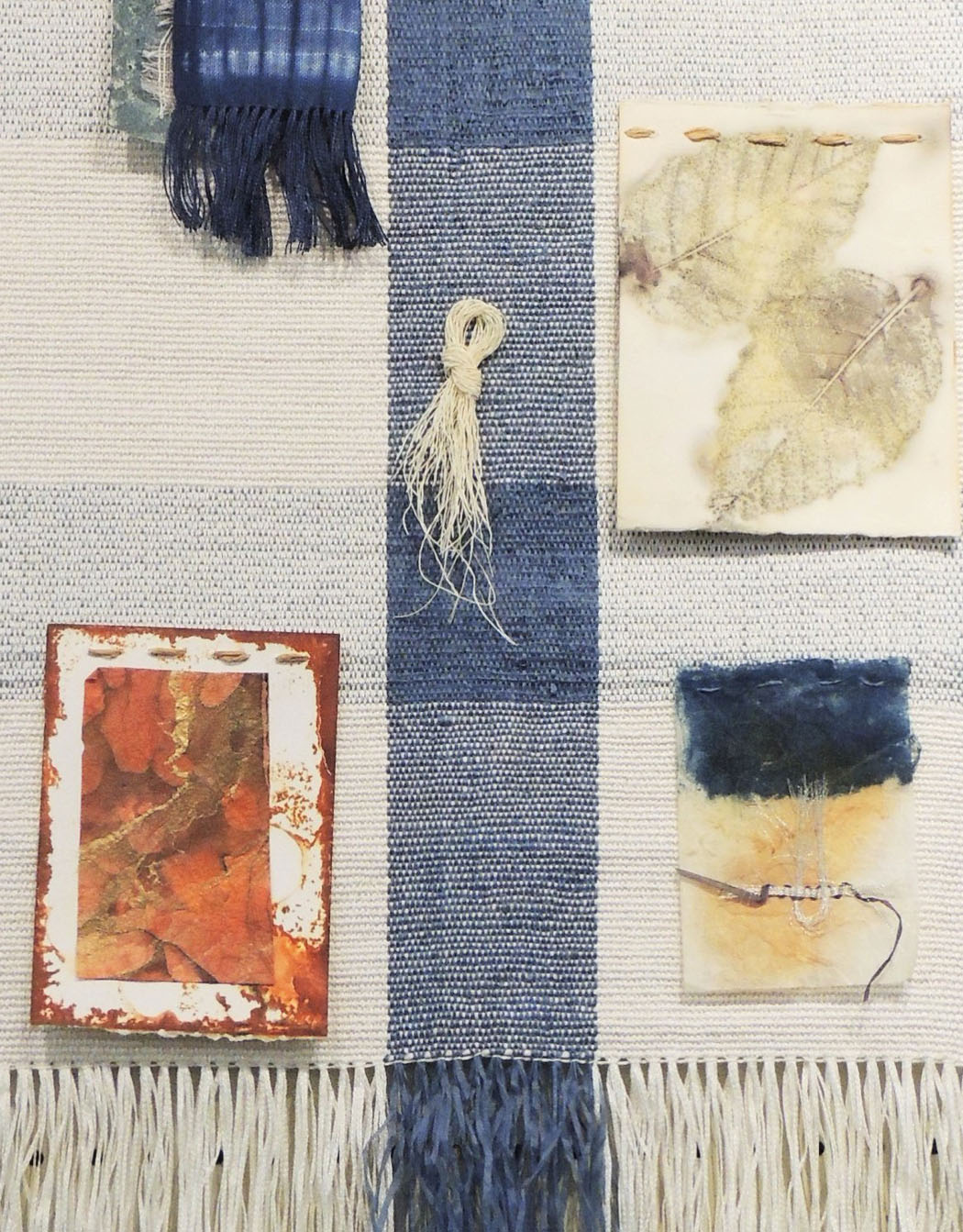 “Threads on Threads,” Kim Thompson’s handwoven piece with Japanese washi paper, linen tape, reeled silk, botanical printed paper, kapa, golf leaf paper, and raffia. photo by CTarleton