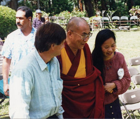 His Holiness the Dalai Lama being escorted by Temple directors Michael and Marya Schwabe for his visit to the Wood Valley Temple in 1994.