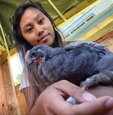 Crystal shows off one of her favorite chickens